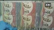 स्वच्छ भारत मिशन के तहत बने शौचालयों में लगाई गई महात्मा गांधी की तस्वीर वाली टाइलें