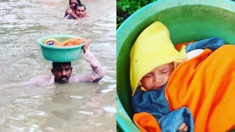 वडोदराः खुद गले तक पानी में डूबा पुलिसकर्मी, सिर पर बच्ची को रखकर बचाई उसकी जान वडोदराः खुद गले तक पानी में डूबा पुलिसकर्मी, सिर पर बच्ची को रखकर बचाई उसकी जान