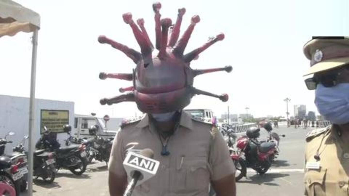 तमिलनाडु: लोगों को जागरूक करने के लिए पुलिसकर्मी ने पहना "कोरोना हेलमेट"