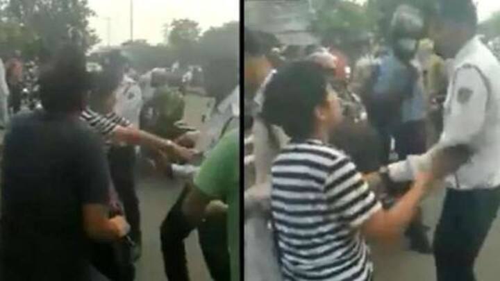 हेलमेट के लिए रोके जाने पर पुलिसकर्मी के साथ धक्कामुकी करने वाली महिला गिरफ्तार, वीडियो वायरल