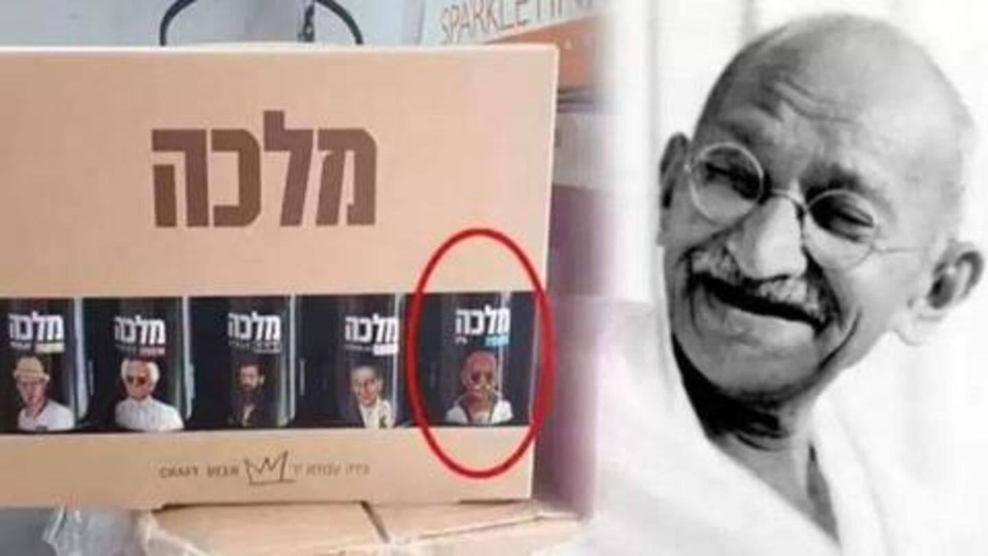 बीयर की बोतल पर टी-शर्ट और काले चश्मे में गांधी की तस्वीर, कंपनी ने मांगी माफी