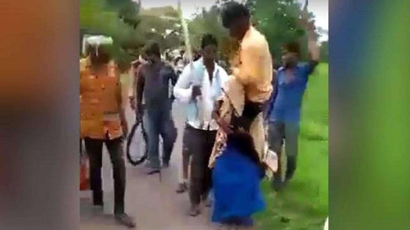 वीडियो: अवैध संबंध के शक में महिला की पिटाई, पति को कंधे पर बैठाकर निकाला जुलूस