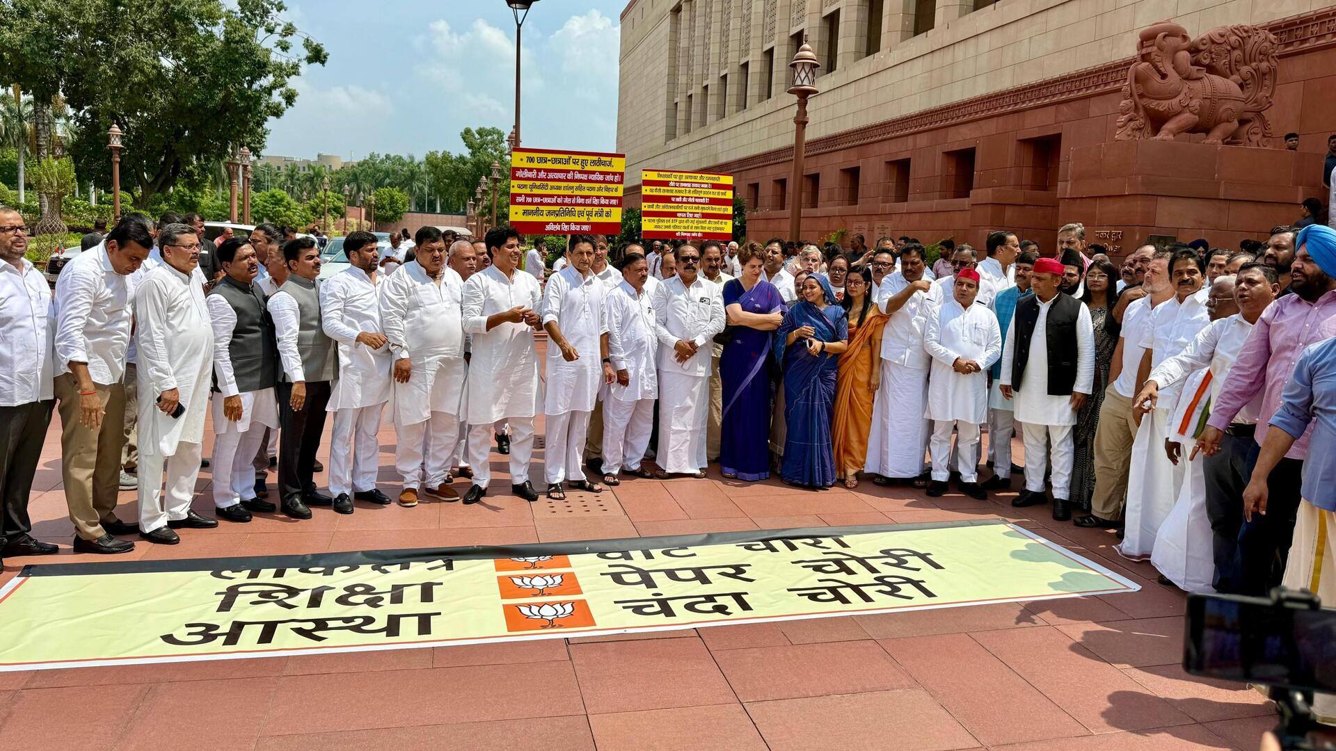 संसद परिसर में प्रदर्शन के बीच धर्मेंद्र प्रधान का स्वागत; पेपर लीक विधेयक पेश, संसद स्थगित