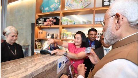 #ModiInSingapore: PM purchases Madhubani painting using a RuPay card #ModiInSingapore: PM purchases Madhubani painting using a RuPay card