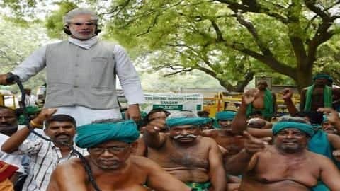 Man in Modi mask flogs TN farmers in new protest Man in Modi mask flogs TN farmers in new protest