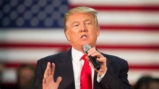 Donald Trump signs refugee order, bans millions