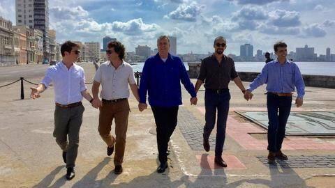 Dutch men walk #handinhand following attack on gay couple Dutch men walk #handinhand following attack on gay couple