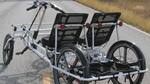 In the Northeast, a two-seater, four-wheeler cycle for maintenance work