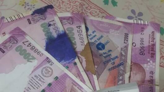 What to do with soiled Rs. 200/2,000 notes