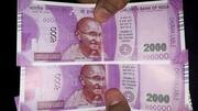 Delhi ATM dispenses half-printed Rs. 2,000 note