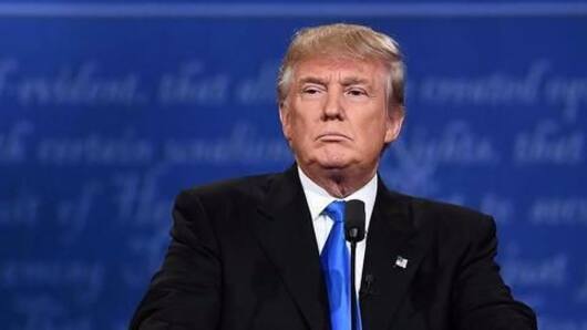 Donald Trump signs refugee order, bans millions