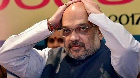 AP special-status: TDP workers block Amit Shah's road, break windshield AP special-status: TDP workers block Amit Shah's road, break windshield