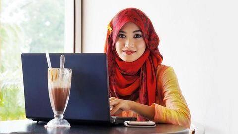 Islamic body bans women from posting photos on social media Islamic body bans women from posting photos on social media
