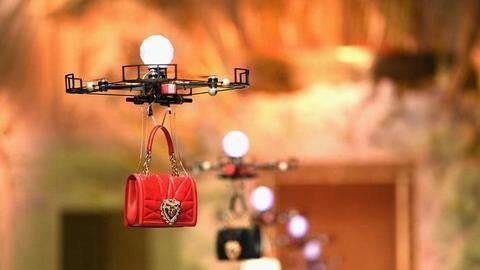 Drones carry D&G handbags in fashion show Drones carry D&G handbags in fashion show
