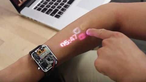 Projector smartwatch turns your arm into a touchscreen interface Projector smartwatch turns your arm into a touchscreen interface