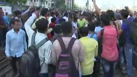 Mumbai: Students demanding jobs block railway tracks, commuters affected Mumbai: Students demanding jobs block railway tracks, commuters affected
