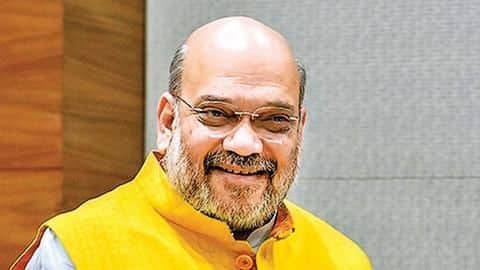 Aadhaar, passport, voter-ID in one: Shah talks about multipurpose card Aadhaar, passport, voter-ID in one: Shah talks about multipurpose card