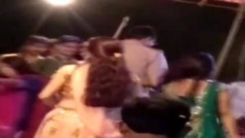Uttar Pradesh: Two on-duty cops shower money on dancers, suspended Uttar Pradesh: Two on-duty cops shower money on dancers, suspended