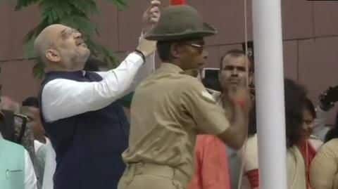 Independence Day: Amit Shah's gaffe during flag-hoisting mocked by Congress Independence Day: Amit Shah's gaffe during flag-hoisting mocked by Congress