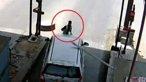 Gurugram: Driver drags toll employee on car's bonnet for 6km Gurugram: Driver drags toll employee on car's bonnet for 6km