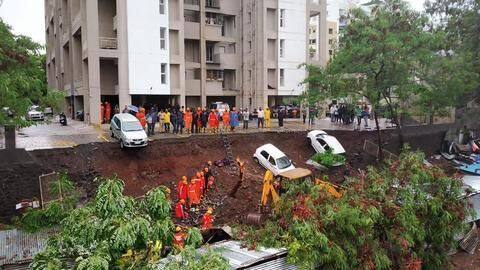 Pune: 17 die after wall in residential-complex collapses; cars stuck Pune: 17 die after wall in residential-complex collapses; cars stuck