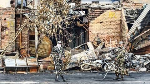 Delhi riots: New video shows mob cornered cops, pelted stones Delhi riots: New video shows mob cornered cops, pelted stones