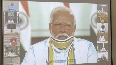 On easing curbs, Modi tells CMs it was "people's will" On easing curbs, Modi tells CMs it was "people's will"
