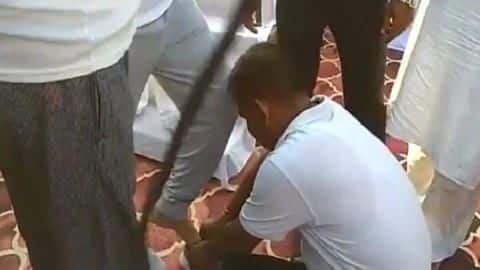 UP: Adityanath's minister gets his shoelace tied by government employee UP: Adityanath's minister gets his shoelace tied by government employee
