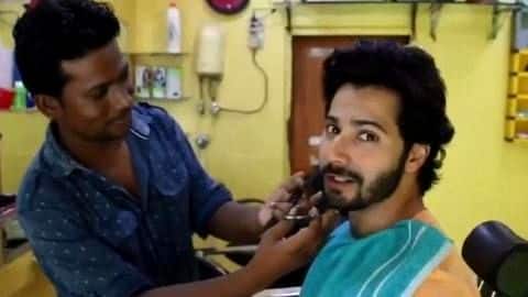 Varun cycles to local barber to get his 'Mauji' look Varun cycles to local barber to get his 'Mauji' look
