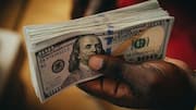US dollar slips from 18-month high on Fed hike doubts