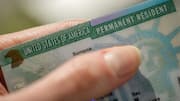 Unions and advocates sue Trump administration over green card rules