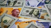 India's foreign exchange reserves fall $12.95 billion to $734.60 billion