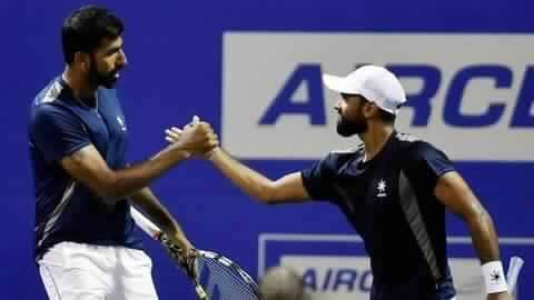 #AsianGames2018: Rohan Bopanna, Divij Sharan clinch men's tennis doubles gold #AsianGames2018: Rohan Bopanna, Divij Sharan clinch men's tennis doubles gold
