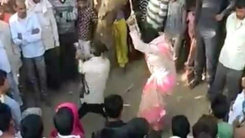 Muzaffarnagar: Woman tied to tree, beaten up over 'illicit relationship' Muzaffarnagar: Woman tied to tree, beaten up over 'illicit relationship'