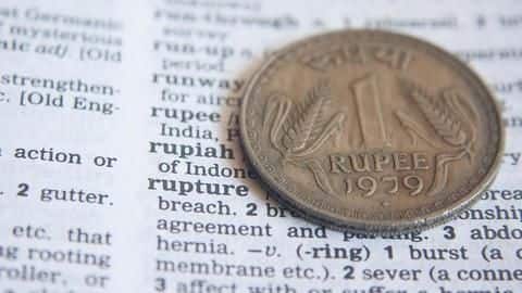 Rupee slumps by 30p; closes at record low of 74.06 Rupee slumps by 30p; closes at record low of 74.06