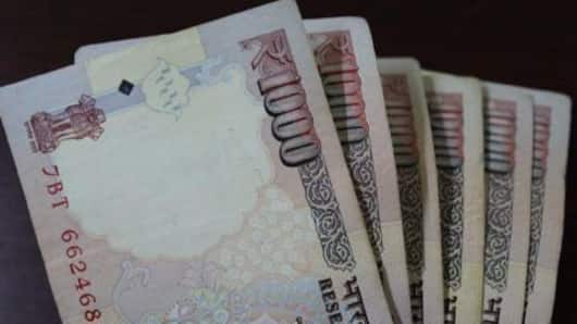 Indian rupee falls on devaluation reports