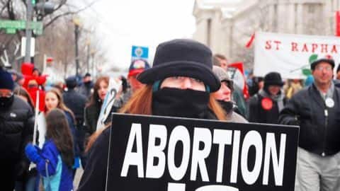 Black-clad Polish women protest against proposed anti-abortion law Black-clad Polish women protest against proposed anti-abortion law