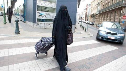 Danish Parliament bans burqa and niqab in public places Danish Parliament bans burqa and niqab in public places