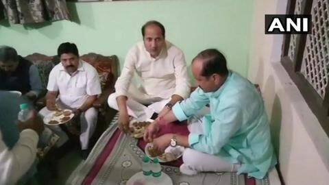 Uninvited, BJP minister barges into a Dalit man's house Uninvited, BJP minister barges into a Dalit man's house
