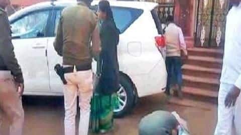 Farmer touches district collector's feet, pleading for electricity connection Farmer touches district collector's feet, pleading for electricity connection