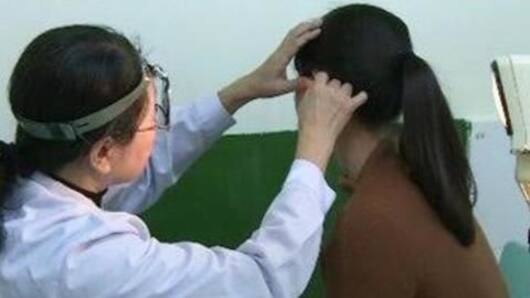 Woman in China is unable to hear men