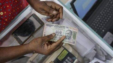 Rupee sinks to new low of 72.18 against USD Rupee sinks to new low of 72.18 against USD