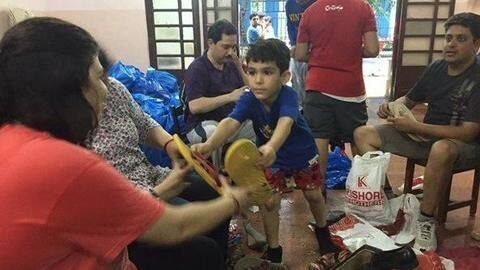 Children collected pans, bowls, cookers from different Parsi Baugs Children collected pans, bowls, cookers from different Parsi Baugs