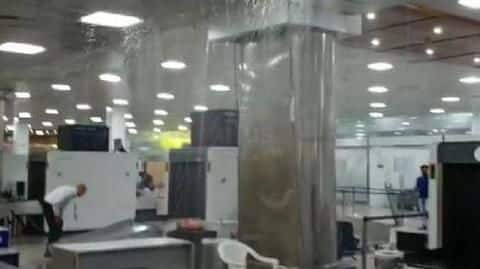 Assam: Rainwater pours through ceiling of Guwahati airport's passenger lounge Assam: Rainwater pours through ceiling of Guwahati airport's passenger lounge