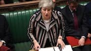 British PM May comes under fire over EU exit deal