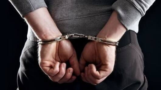 20 liquor gang members held for cops' murder