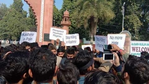 AMU students protest civilian killings in Kashmir, hold candlelight march AMU students protest civilian killings in Kashmir, hold candlelight march