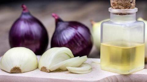 Here's how onion juice can help prevent hair loss Here's how onion juice can help prevent hair loss