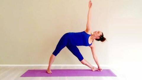 The Triangle pose stretches and strengthens your back The Triangle pose stretches and strengthens your back