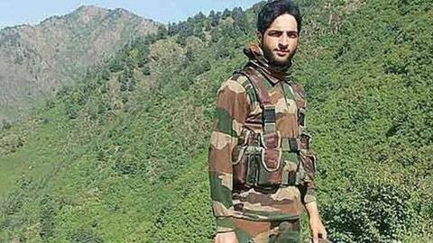 Terrorist Burhan Wani's father hoists national flag in J&K's Pulwama Terrorist Burhan Wani's father hoists national flag in J&K's Pulwama